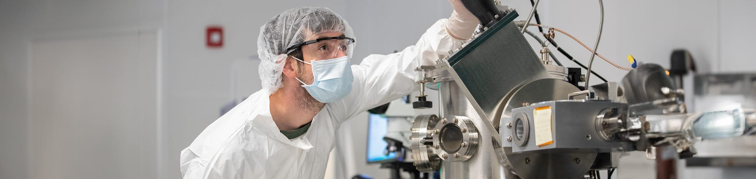 Student inside nanofabrication cleanroom at the Bourns College of Engineering